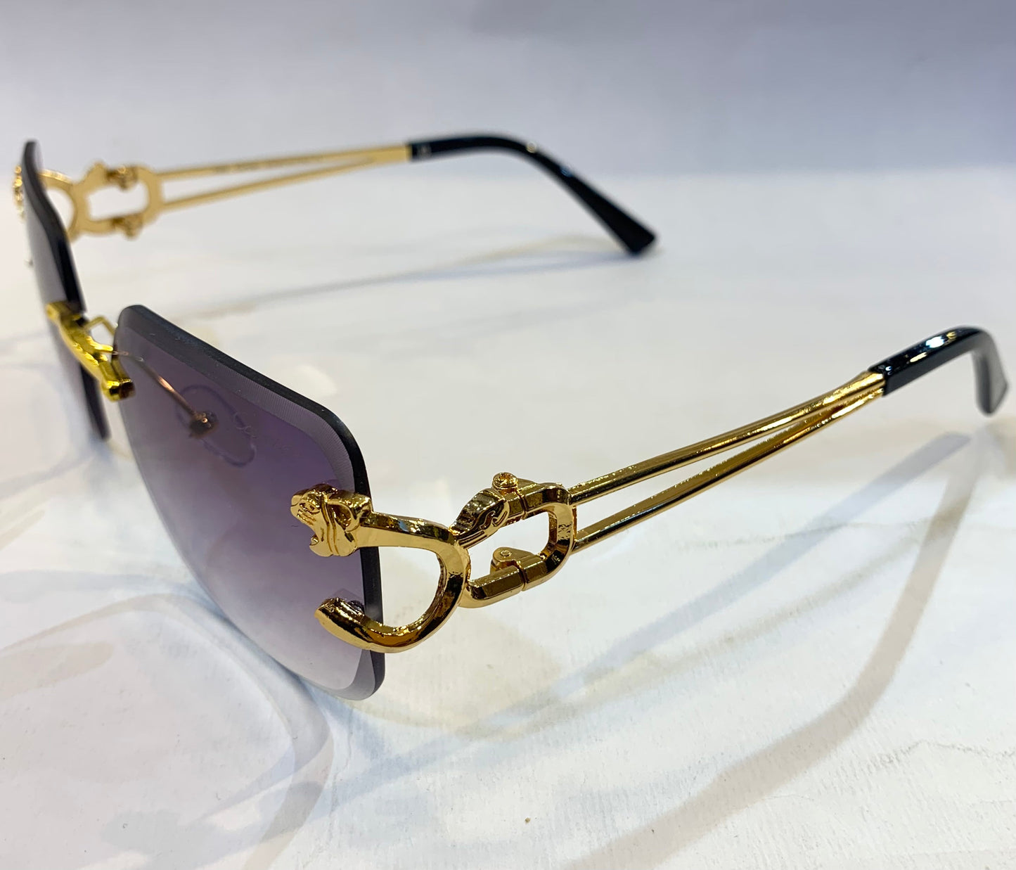 RAC Frameless Golden Black Stick Purple Shade Sunglass