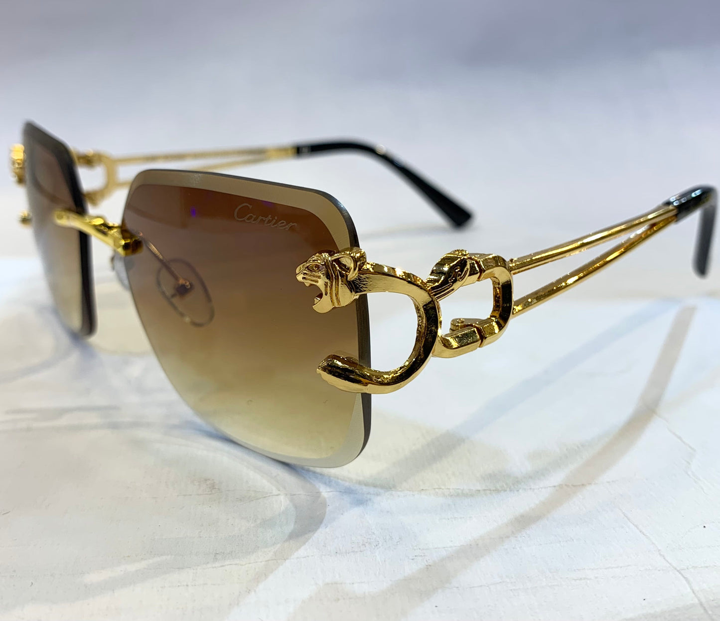 RAC Frameless Golden Black Stick Brown Shade Sunglass