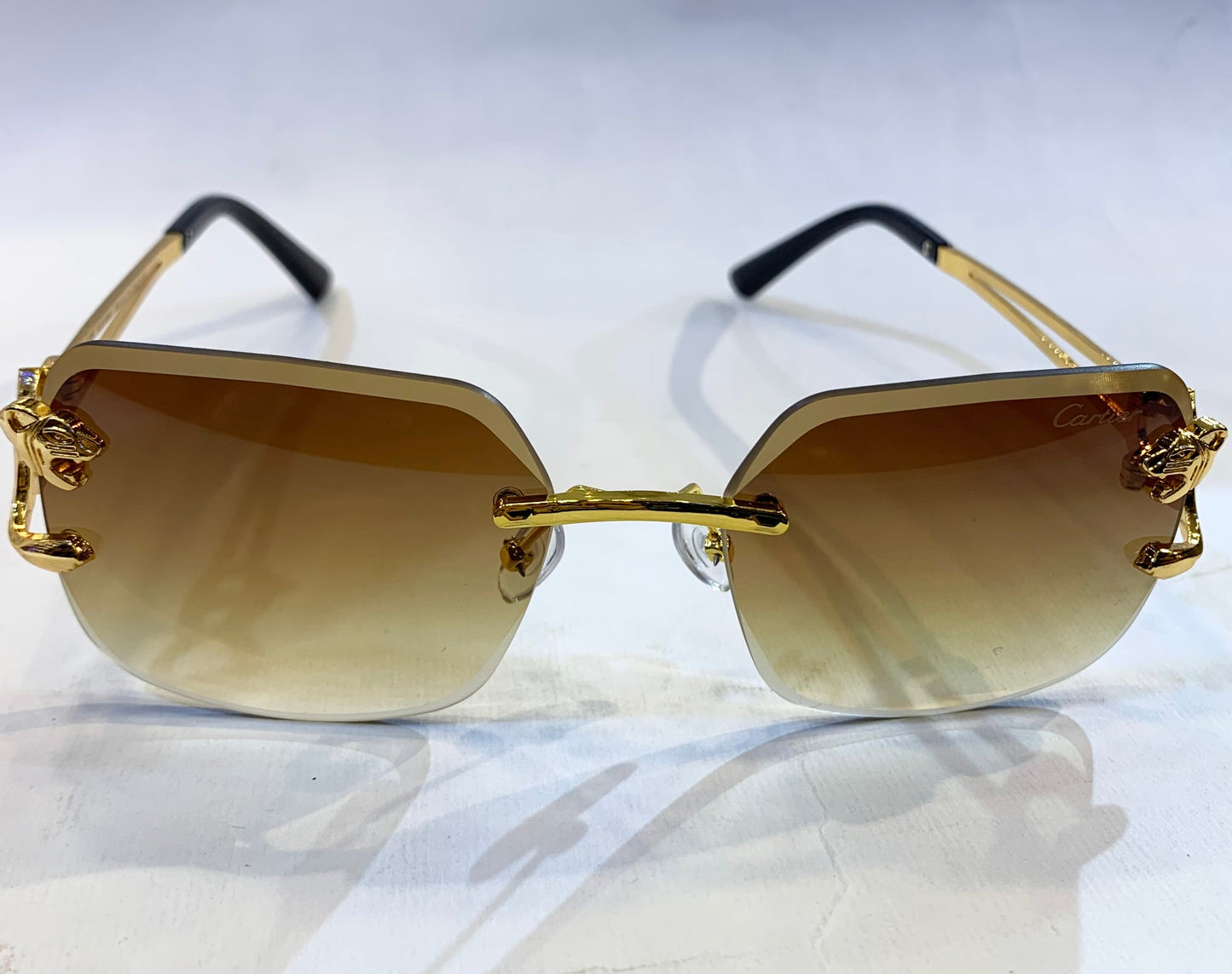 RAC Frameless Golden Black Stick Brown Shade Sunglass